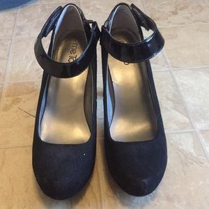 Black suede and fax patent leather heel and strap.